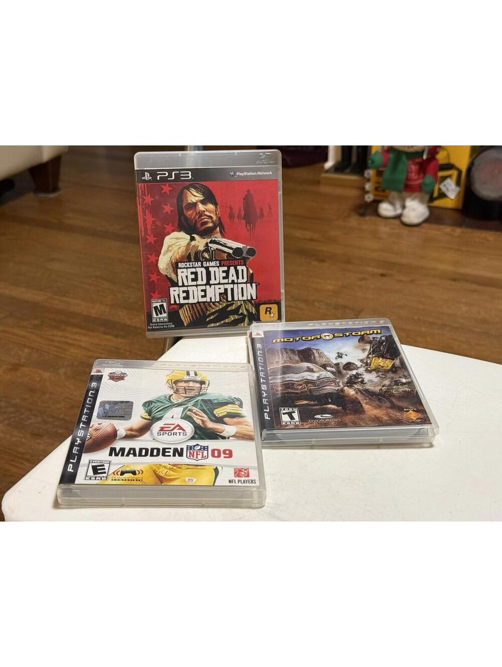 PS3 Games Lit Of 3 , Red Dead Redemption, Motor Storm, Madden 09